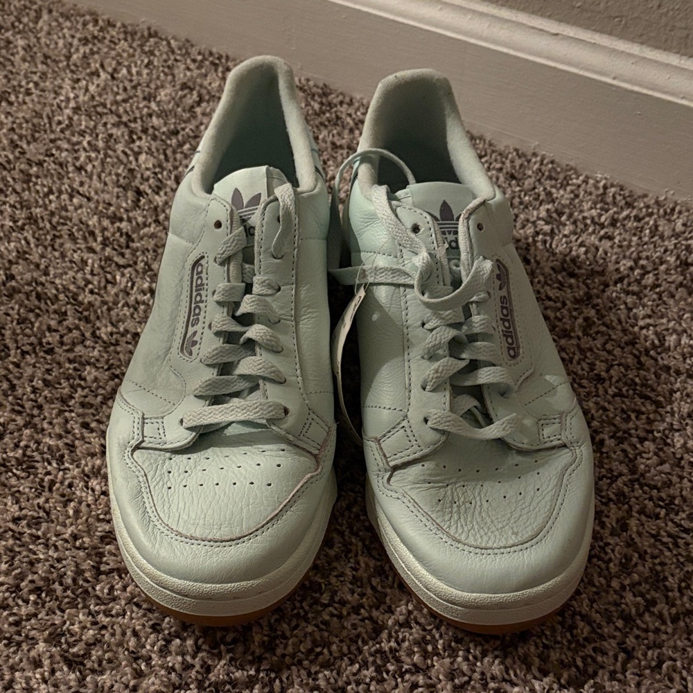 Adidas Light Green Casual Sneakers
Brand New with tags/ Never Worn